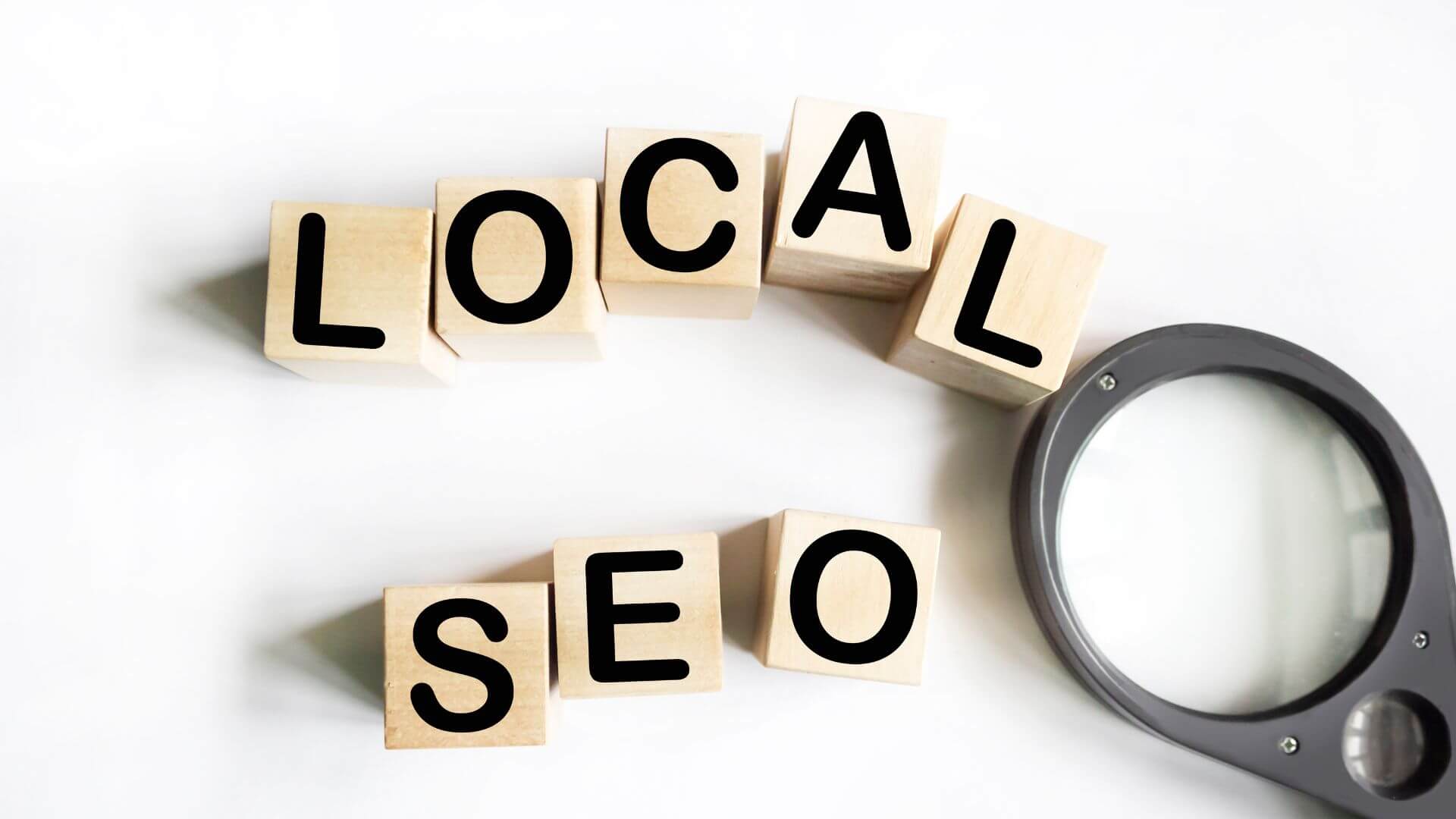image with the words local SEO and a magnifying glass